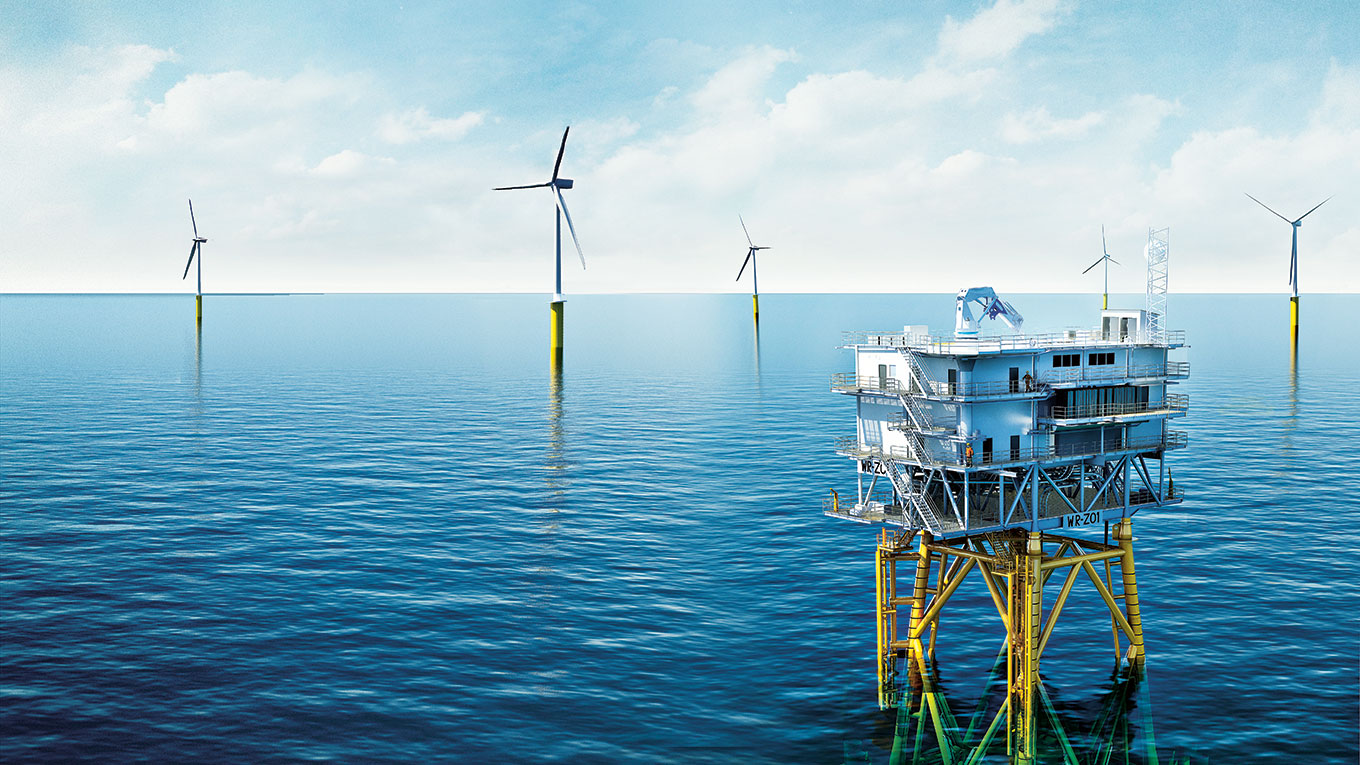 Offshore Oil and Gas Rig with Wind Farm in the background Image